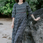 Ethical and sustainable cotton dress styled for versatile occasions.