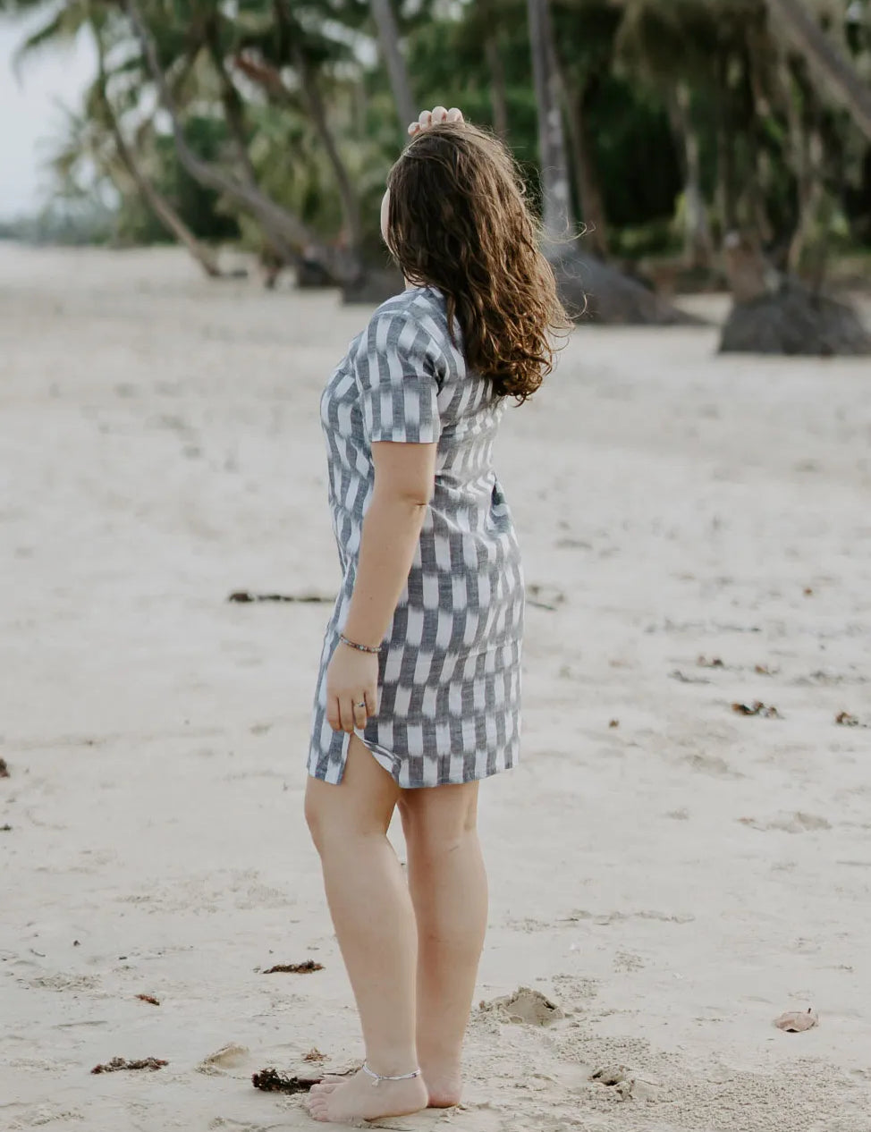 Elegant Carrie Short Dress with a round neck and flattering above-the-knee design. Soft handloomed cotton