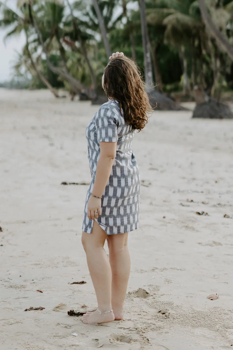 Elegant Carrie Short Dress with a round neck and flattering above-the-knee design. Soft handloomed cotton