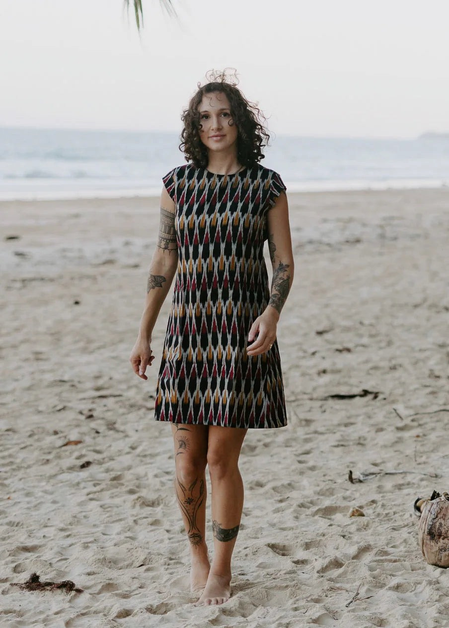 Ethically made short dress paired with beachside elegance