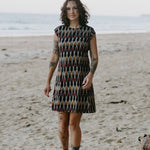 Ethically made short dress paired with beachside elegance