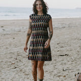 Ethically made short dress paired with beachside elegance