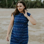 Woman at low tide wearing Tara Shirt shift dress. 