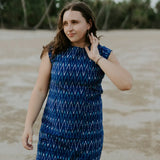 Woman at low tide wearing Tara Shirt shift dress. 