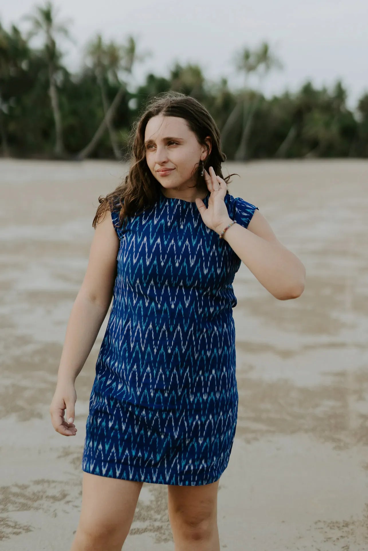 Woman at low tide wearing Tara Shirt shift dress. 