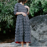 Relaxed-fit ethical dress made from breathable cotton fabric.